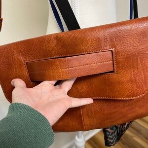 Caramel clutch, unbranded, comes with matching detachable shoulder strap. 14x9